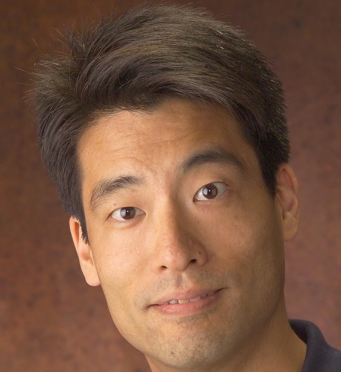 BRUCE Y. LEE