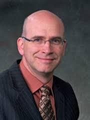 DR. AIDAN HOLLIS